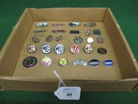 Quantity of approx twenty eight enamel car and motorcycle badges and plaques to include: MG,