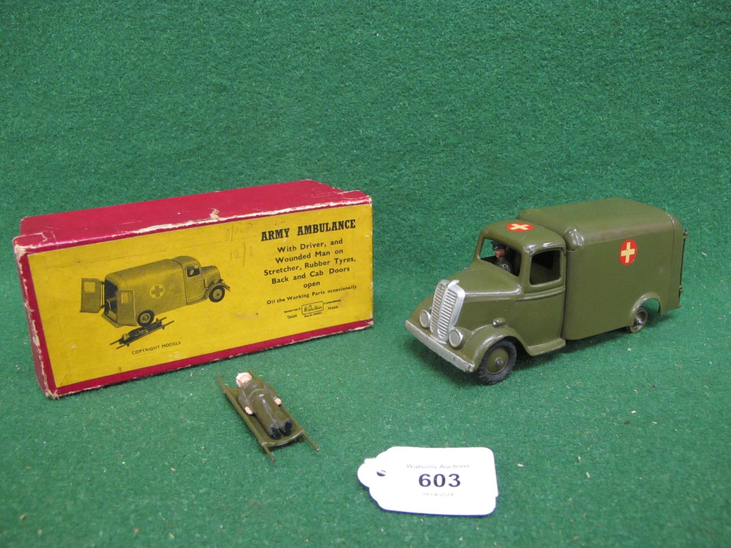 Britains 1948-1956 Army Ambulance with driver, three opening doors and injured soldier on stretcher,