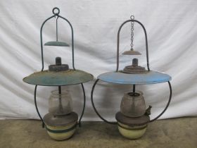 Two painted hanging paraffin lamps - approx 59cm tall Please note descriptions are not condition