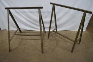 Two metal trestle stands - 70cm and 80cm wide x 77cm tall together with two small wooden saw