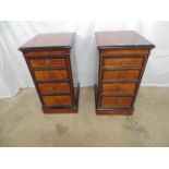 Pair of burr walnut and ebonised bedside chests of four graduated drawers, standing on plinth