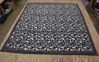 Large floral needlework on a black ground - approx 213cm x 234cm Please note descriptions are not