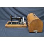 Harris S hand operated sewing machine Syst.705 housed in walnut case with top carrying handle - 40cm