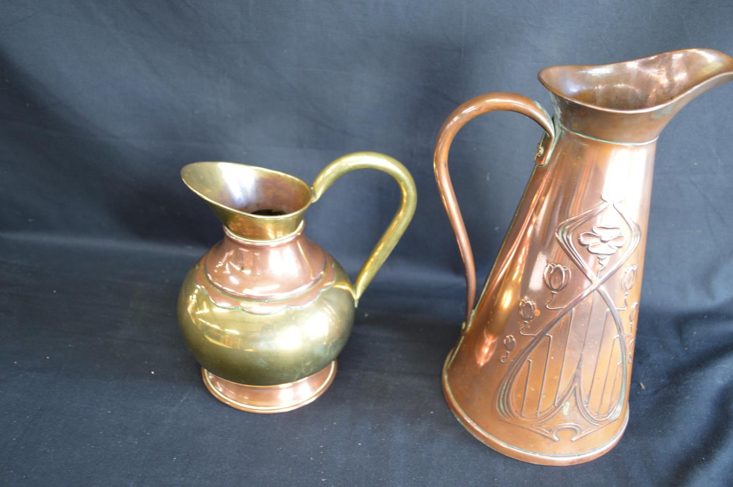 JS & S Art Nouveau copper embossed jug - 29cm tall together with one other smaller brass and - Image 2 of 4