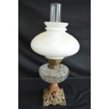 Victorian iron base oil lamp with cut glass reservoir and white domed shade - 50cm tall including