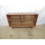 Mid century mahogany display/bookcase having two glazed sliding doors opening to two adjustable