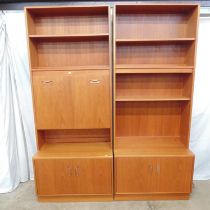 Two mid century G Plan teak wall units, one having two shelves over a fall front opening to reveal a