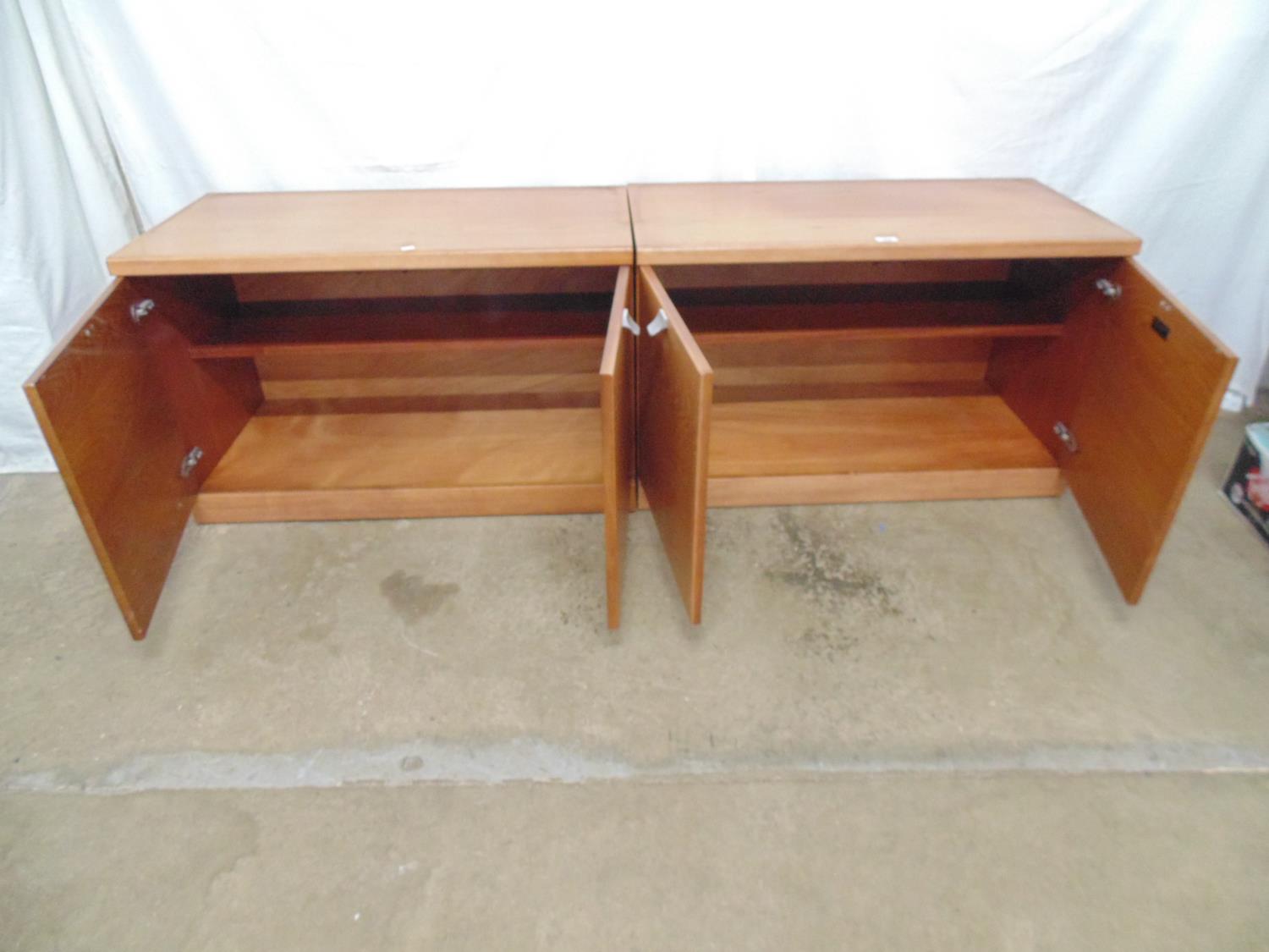 Pair of mid century teak cupboards the two door opening to a single fixed shelf, standing on - Image 3 of 4