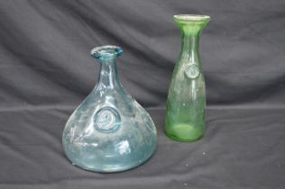 Pale blue Holmgaard glass carafe with Viking face seal - 22cm tall together with a green glass