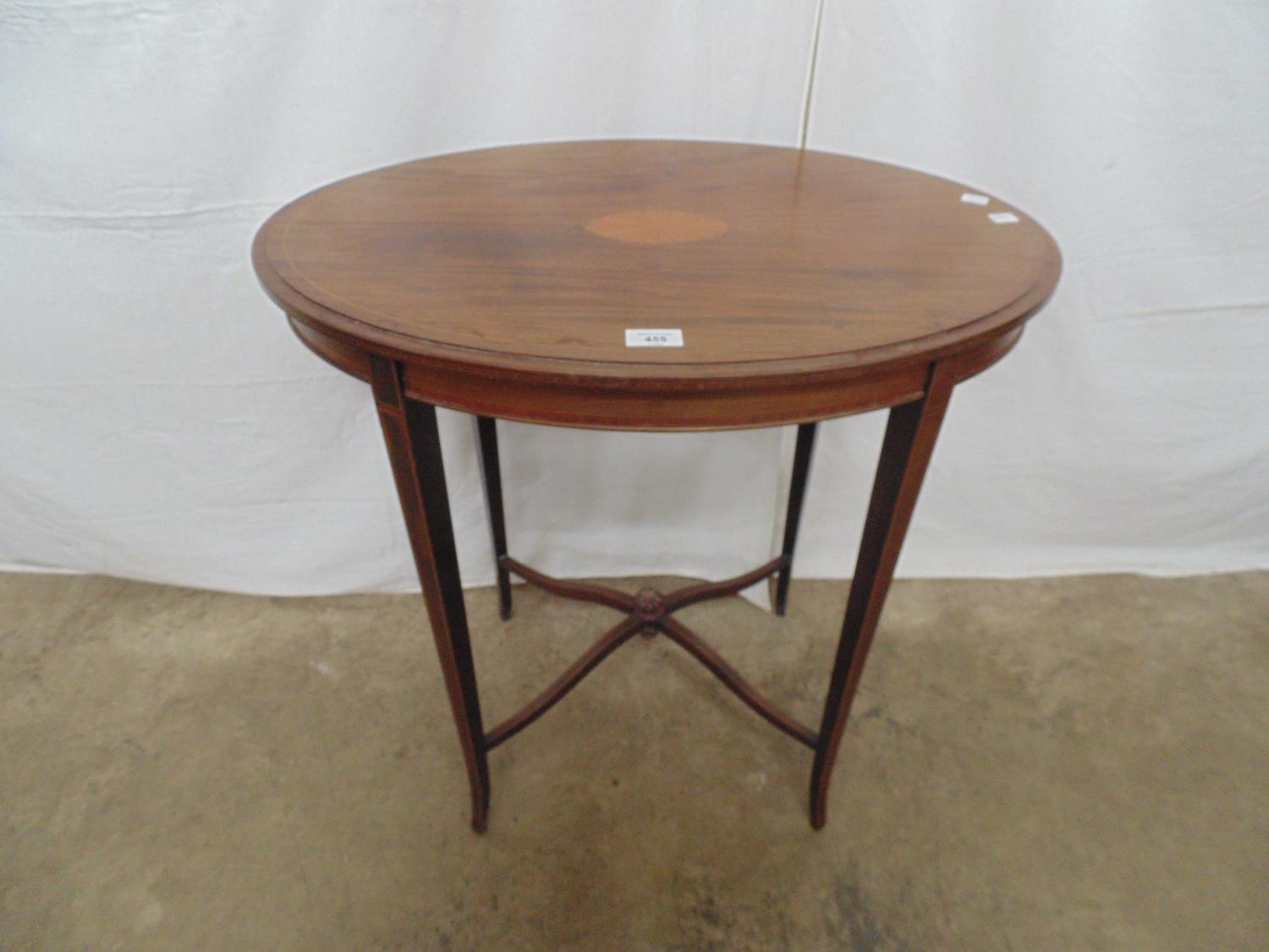 Mahogany inlaid occasional table having central cartouche, standing on inlaid tapering splay legs