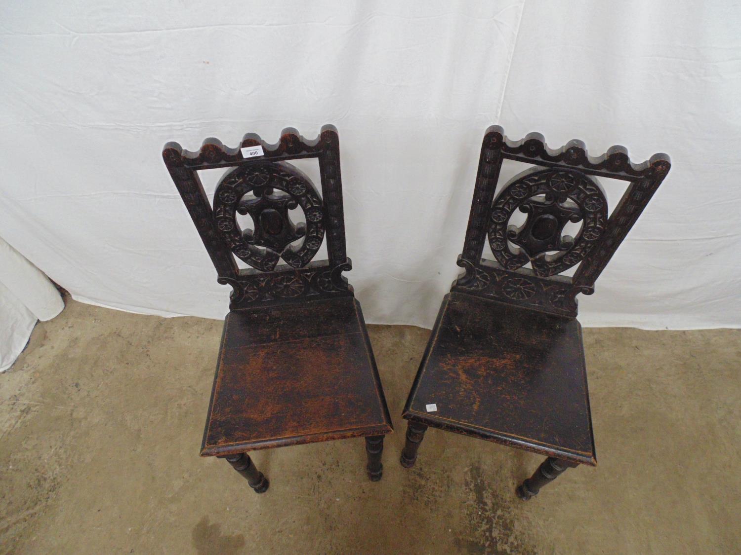 Pair of oak hall chairs having carved backs, solid seats and turned front legs - 42cm x 38cm x - Image 3 of 4