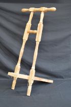 Folding wooden boot jack having turned handles - 81cm tall Please note descriptions are not