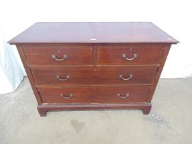 Mahogany inlaid cross banded chest of two short over two long drawers, standing on bracket feet -
