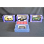 Three boxed 1:16 scale Mini Cooper models together with boxed Corgi Queen Mothers Century Tram