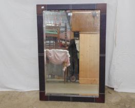 Modern oak bevel edge mirror having brown leather inset edges to wooden frame - 69cm x 101cm