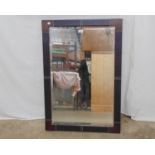 Modern oak bevel edge mirror having brown leather inset edges to wooden frame - 69cm x 101cm