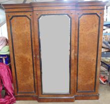 19th century burr walnut and ebonised breakfront triple wardrobe with mirrored centre door, standing