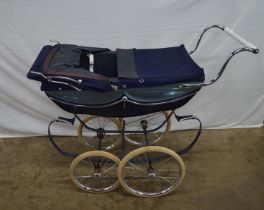 Silver Cross dolls pram in blue livery - 90cm x 77.5cm tall Please note descriptions are not