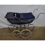 Silver Cross dolls pram in blue livery - 90cm x 77.5cm tall Please note descriptions are not