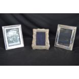 Silver photograph frame having floral decoration, hallmarked for Edinburgh - 18cm x 21cm together