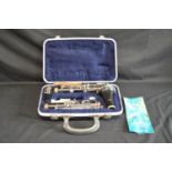 Cased Artley 8s hardwood clarinet Please note descriptions are not condition reports, please request