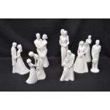 Group of twenty seven Coalport Moments figures to include Brides & Grooms etc Please note