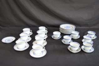 Late 20th century Oriental part teaset having blue dragon decoration on a white ground with blue