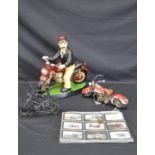 Group of three motorcycle ornaments together with a quantity of Harley Davidson Collect-A-Card cards