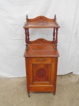 Victorian walnut coal purdonium having a small shelf with gallery raised on turned supports over