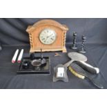 Box of sundry items to include: oak mantle clock, pair of wood faux candles and quantity of ebony