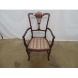 Inlaid mahogany armchair with pink stripey upholstered seat, standing on front cabriole legs with