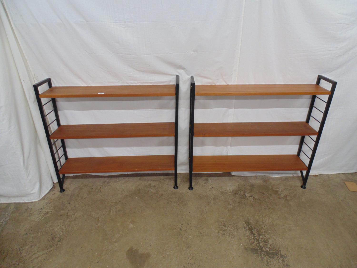 Two modular teak shelf units each having three shelves - 94cm x 21cm x 88cm tall Please note