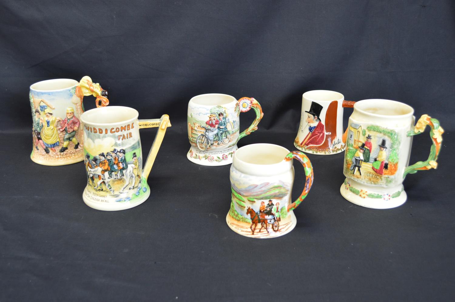 Group of ceramics and glassware to include: musical tankards, three Wedgwood animal paperweight