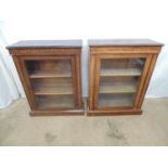 Pair of inlaid rosewood pier cabinets with banded frieze and uprights, single glazed door