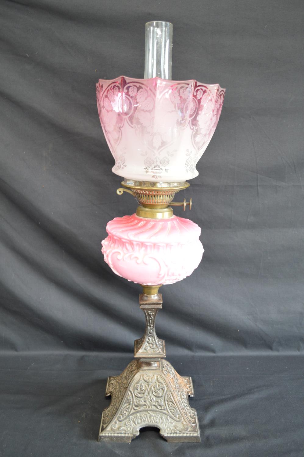 Victorian iron based oil lamp with pink glass reservoir and Cranberry glass shade - 69cm tall - Image 3 of 5