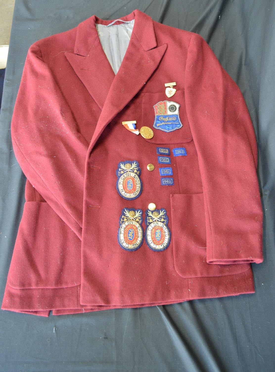 Two shooting club jackets having England cloth badges attached to breast pockets and a quantity of