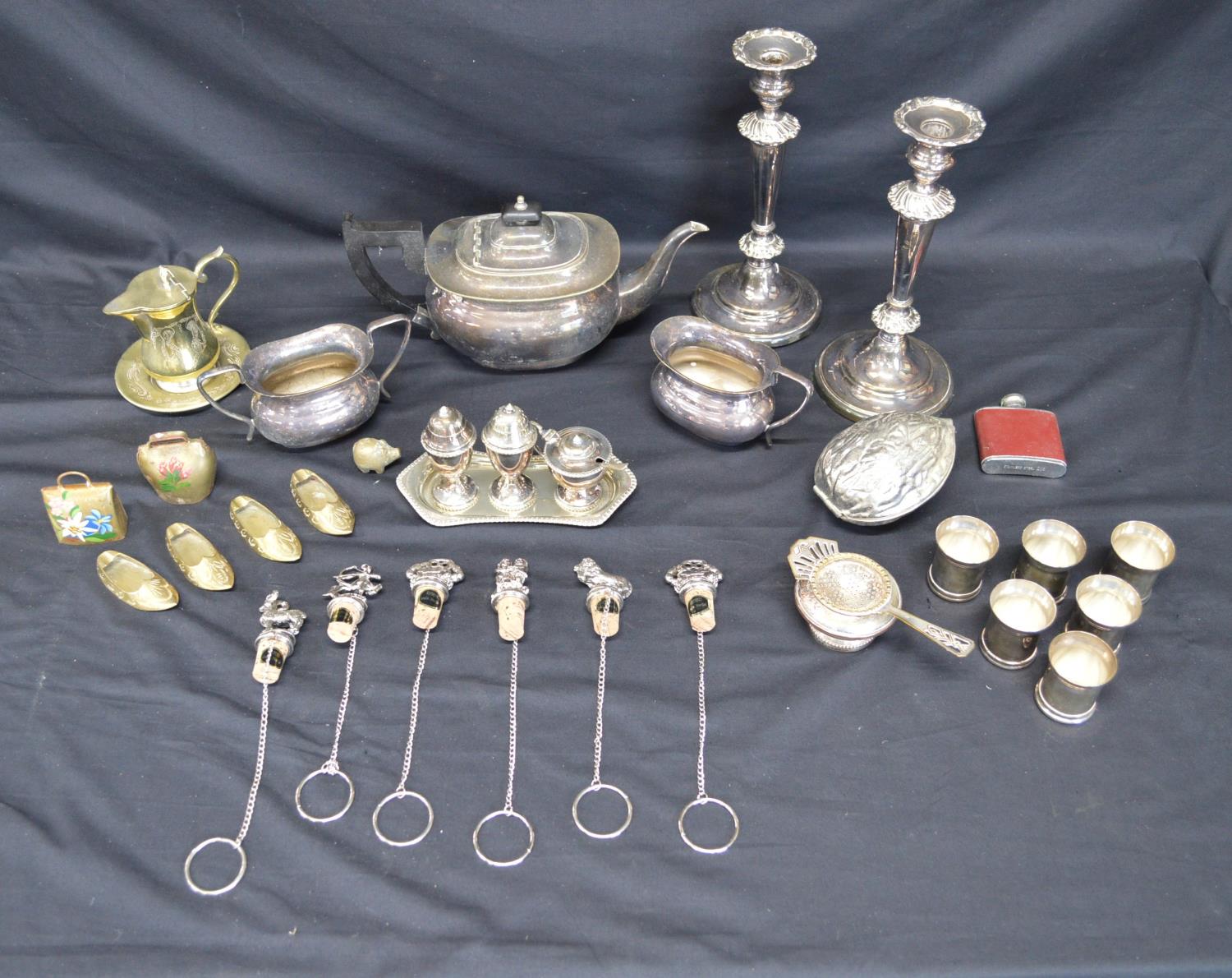 Collection of silverplate to include: three piece teaset, cruet set and tea strainer etc Please note