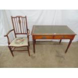 Mahogany writing desk having green leather insert to top over two drawers, standing on turned