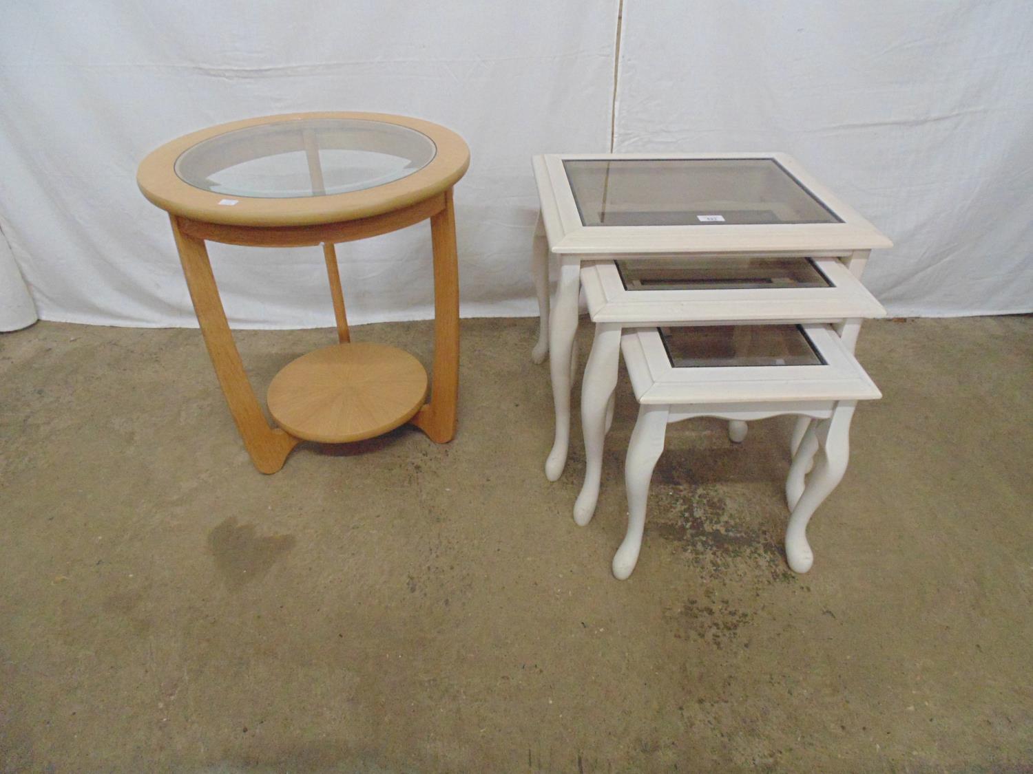Painted nest of three glass topped tables, standing on cabriole legs - 51cm x 42cm x 47cm (