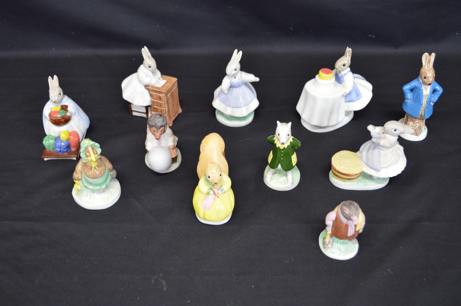 Group of eleven Coalport animal figures to include: rabbits, hare and hedgehog etc Please note