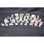 Group of forty six various Wade Whimsie figures of animals to include: pigs, penguins, bears and