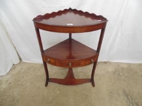 Georgian mahogany corner washstand the upper tier having a raised back, the lower tier having a