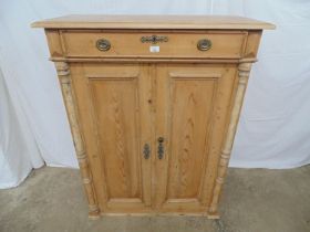 Victorian pine Continental style cupboard having a rectangular top over single drawer with two