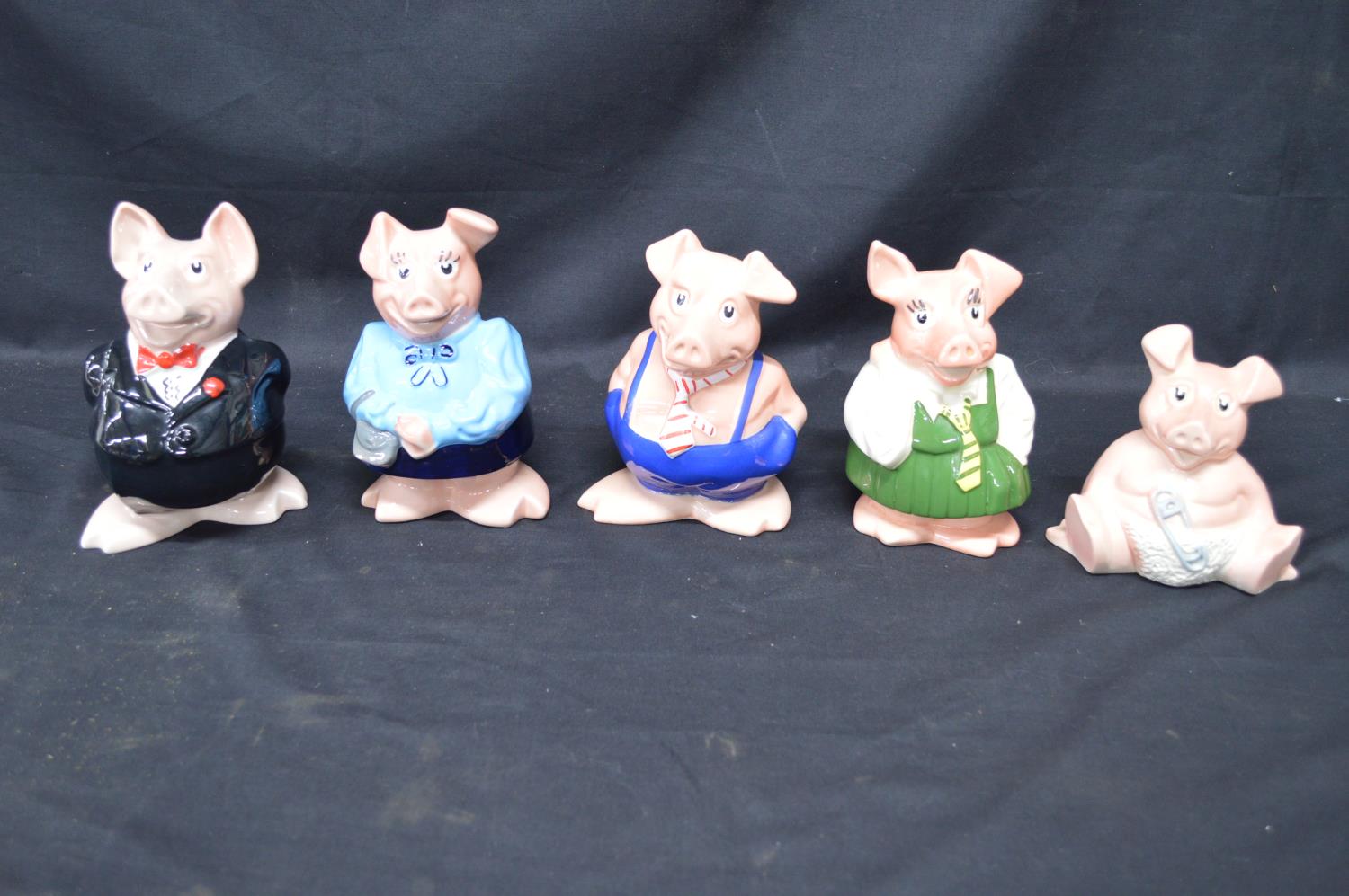 Set of five Wade Natwest pig money boxes Please note descriptions are not condition reports,