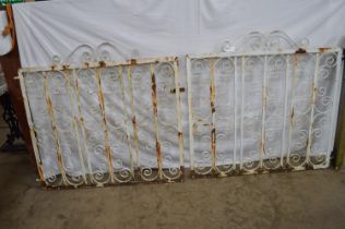 Pair of painted scrolled iron drive gates - 105cm x 98.5cm high each Please note descriptions are