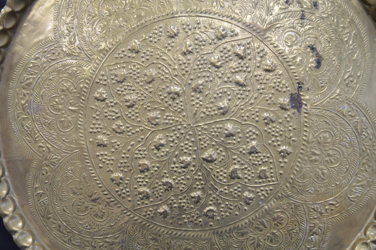 Large circular brass tray with decorative embossed decoration - 89cm dia Please note descriptions - Image 2 of 3