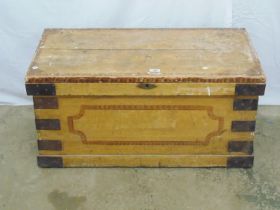 Pine metal bound trunk with side carrying handles (one missing), standing on plinth base - 90cm x