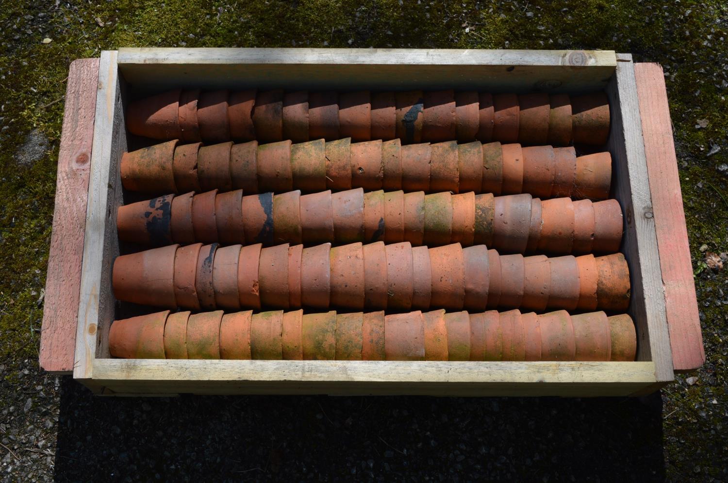 Approx ninety small terracotta plant pots - approx 7cm tall each Please note descriptions are not