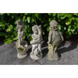 Two small garden statues of young ladies - approx 62cm tall together with a cherub water fountain