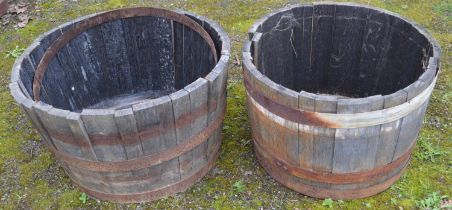 Two oak half barrel planters - 60cm dia x 40cm tall Please note descriptions are not condition